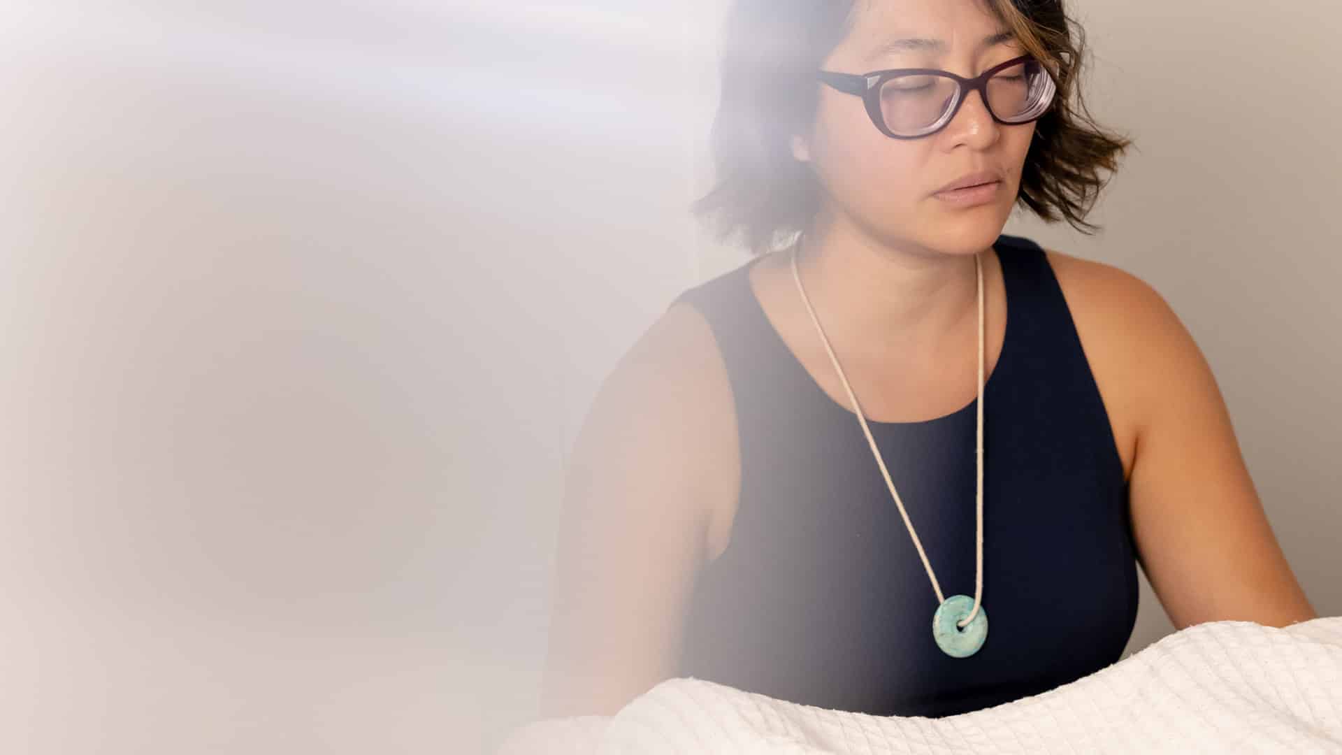 Diana Nguyen guiding gentle breathwork exercises in Wollongong
